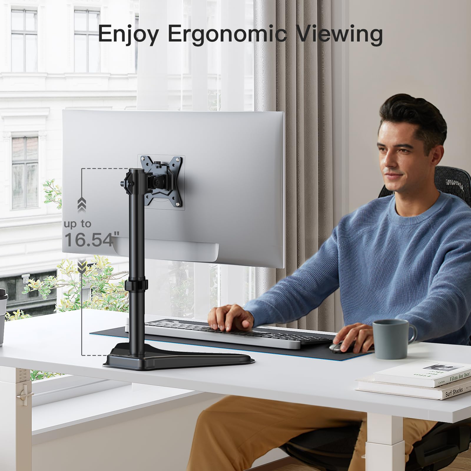 Person using HUANUO monitor mount for ergonomic viewing with 32-inch screen.
