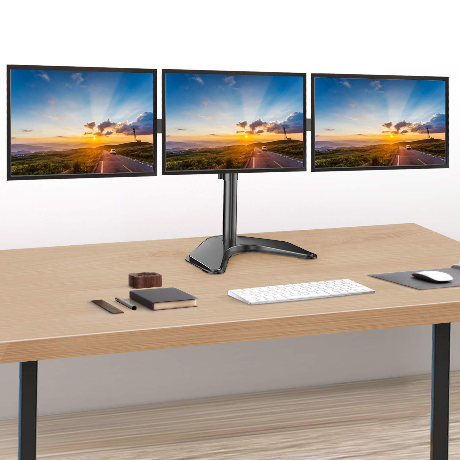 Ergonomic triple monitor stand for three 13" to 24" screens on a workspace