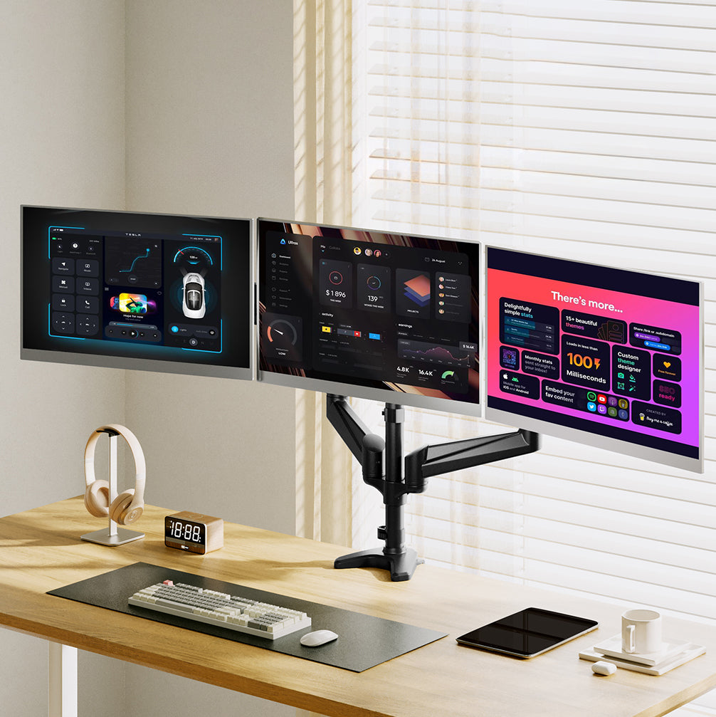 Triple monitor setup with HUANUO mount showcasing three screens and an organized desk.