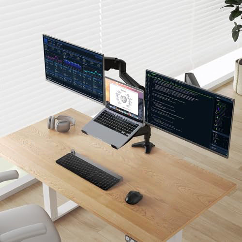 Ergonomic dual monitor and laptop mount setup on a wooden desk