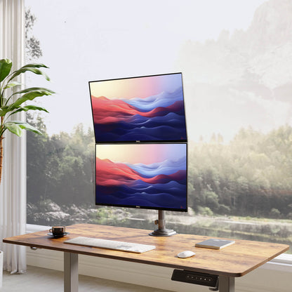 Elevated dual monitor setup on a wooden desk near a scenic window view.