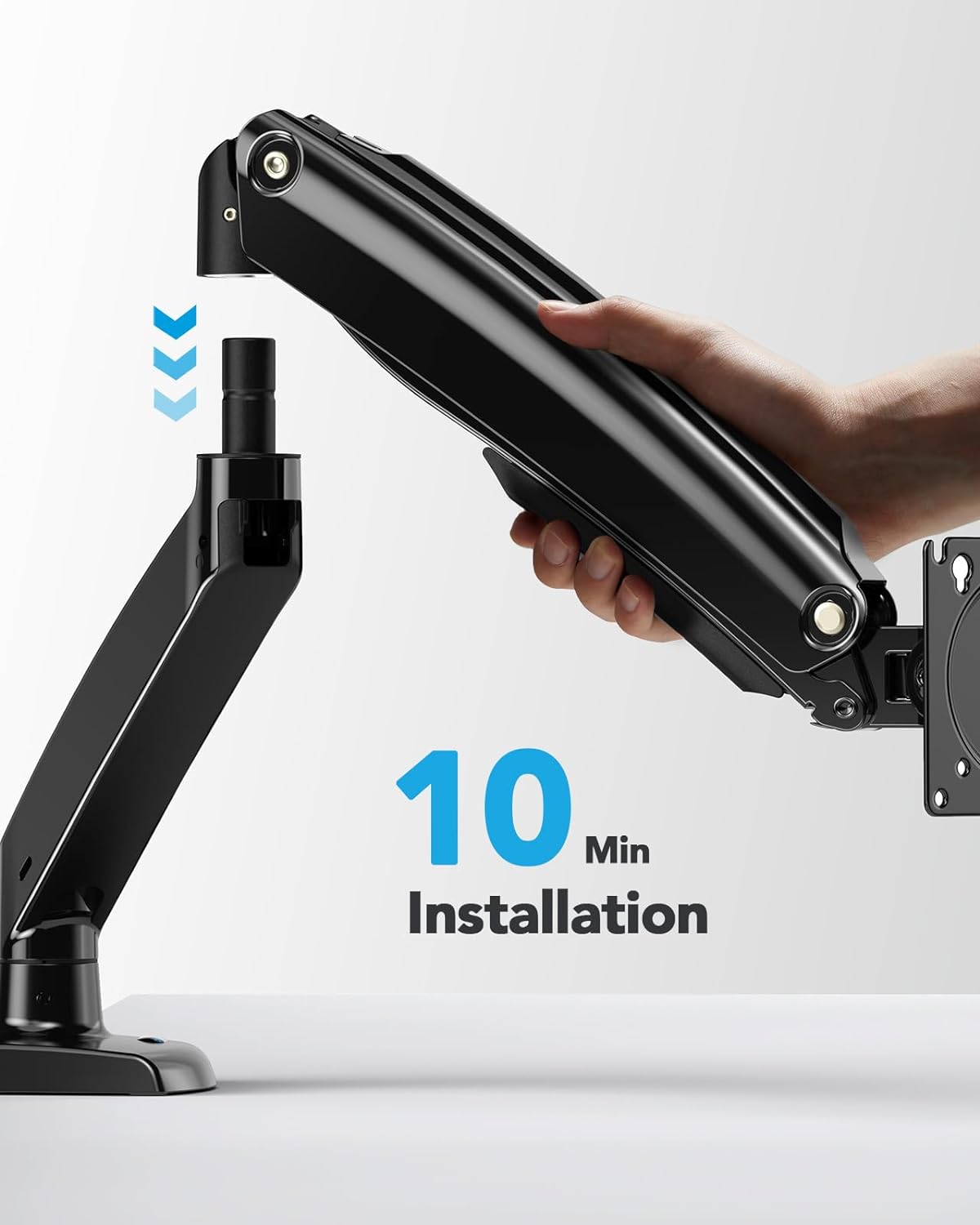 Hand installing HUANUO monitor mount with 10-minute installation guide.