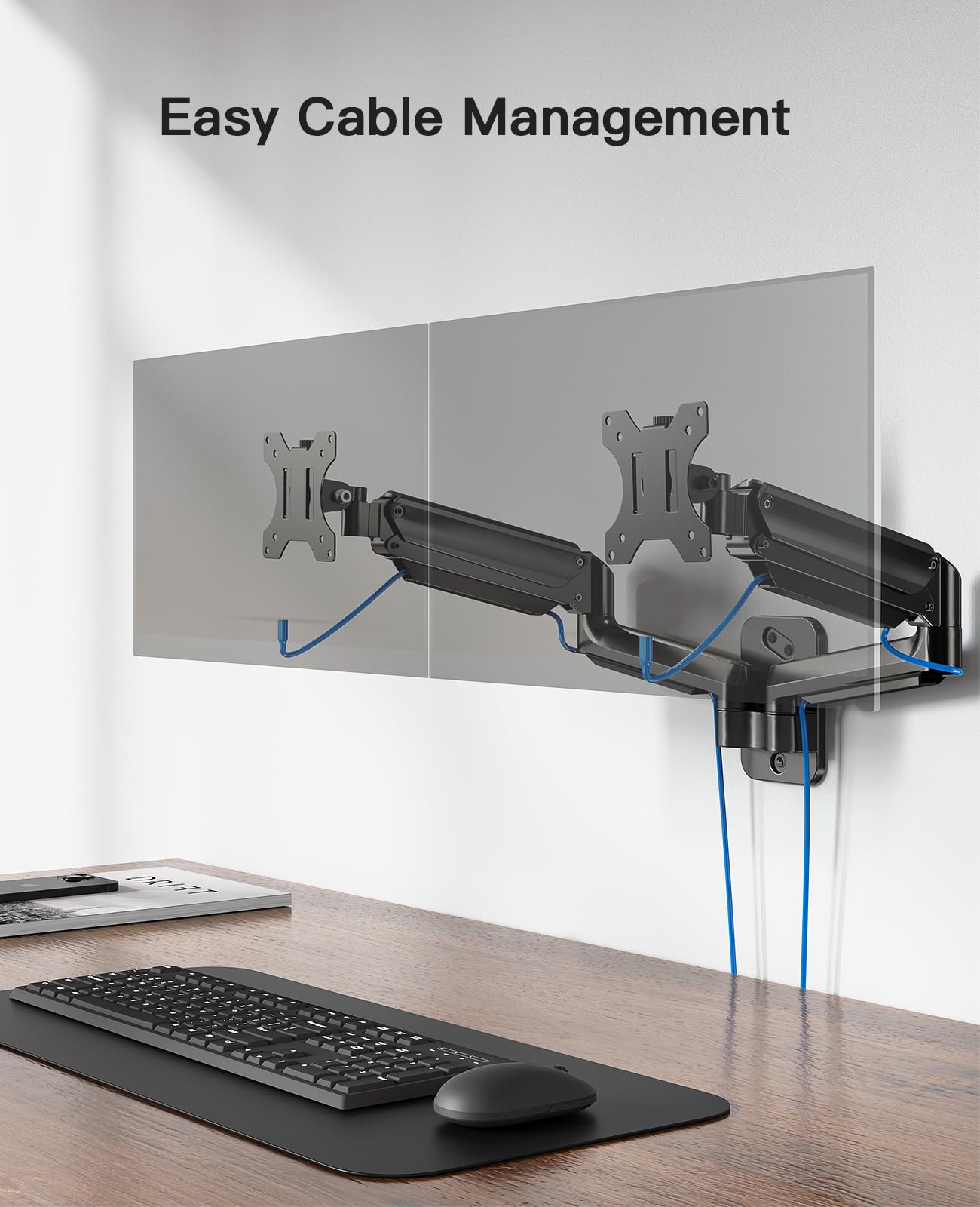 Dual monitor wall mount showcasing cable management feature in an ergonomic workspace.