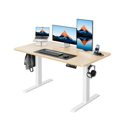 HUANUO electric standing desk with dual monitors, laptop, and office accessories setup.