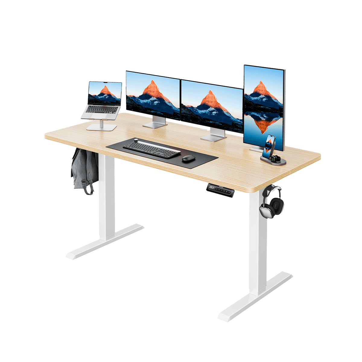 Ergonomic electric standing desk with four monitors, laptop, and keyboard setup.