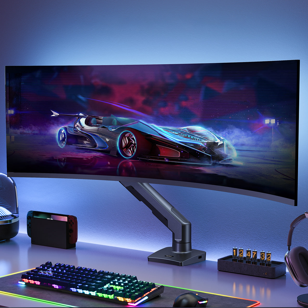 Ultrawide monitor mounted on HUANUO arm displaying vibrant racing graphics.